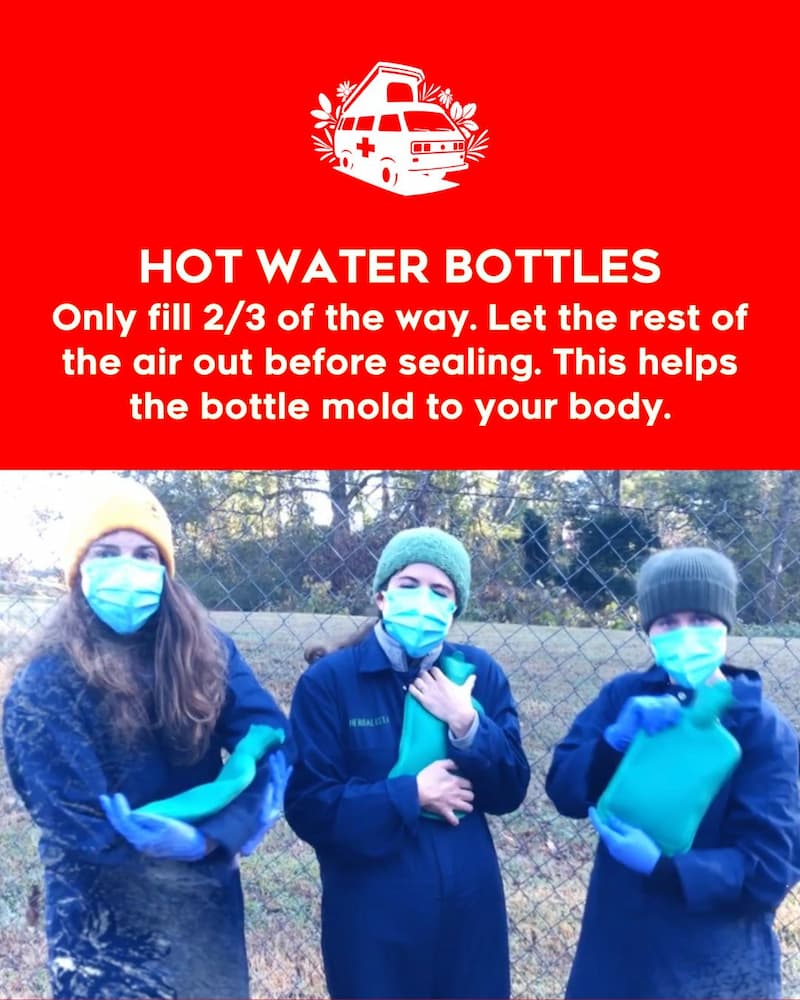 text reads Hot Water Bottles and shows three herb clinc volunteers with hats and masks, holding hot water bottles.